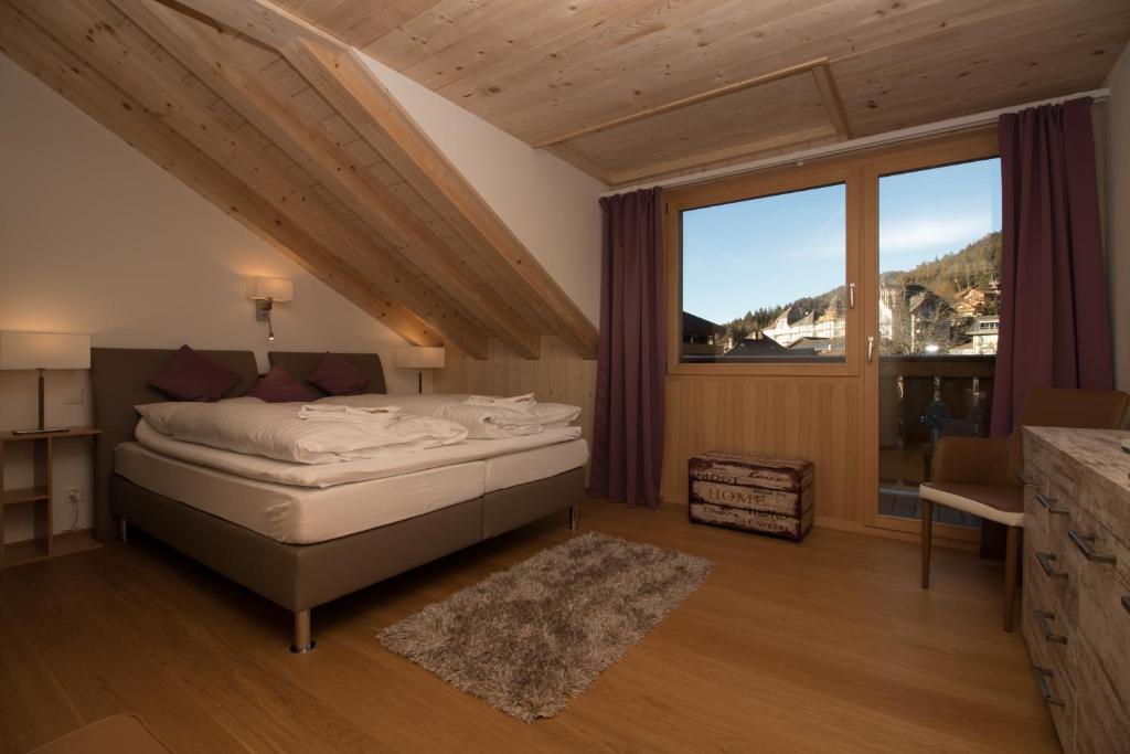 Postel nebo postele na pokoji v ubytování Chalet Belmont Penthouse