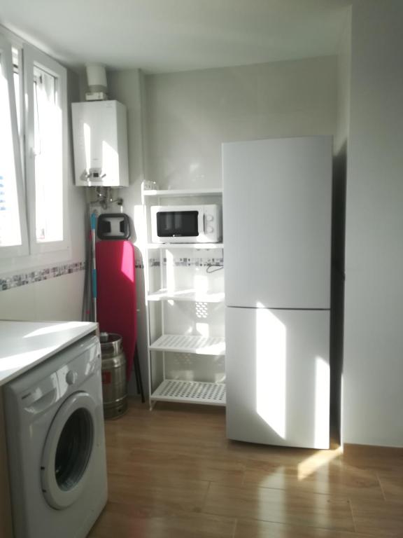 Kuchyň nebo kuchyňský kout v ubytování Bay Home