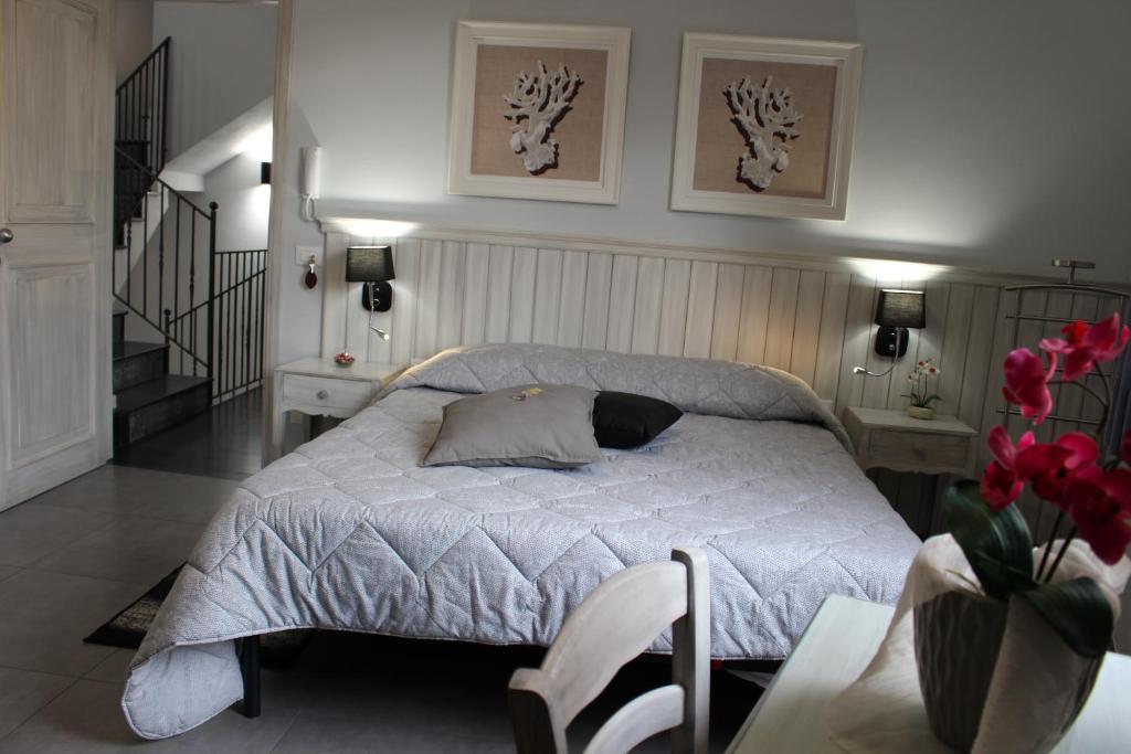 Postel nebo postele na pokoji v ubytování Bed & Breakfasts Conte Perollo