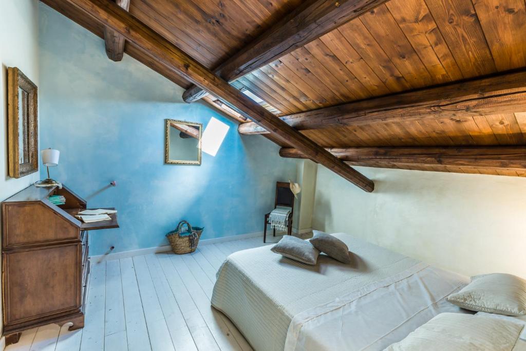 Cama ou camas em um quarto em La Masseria