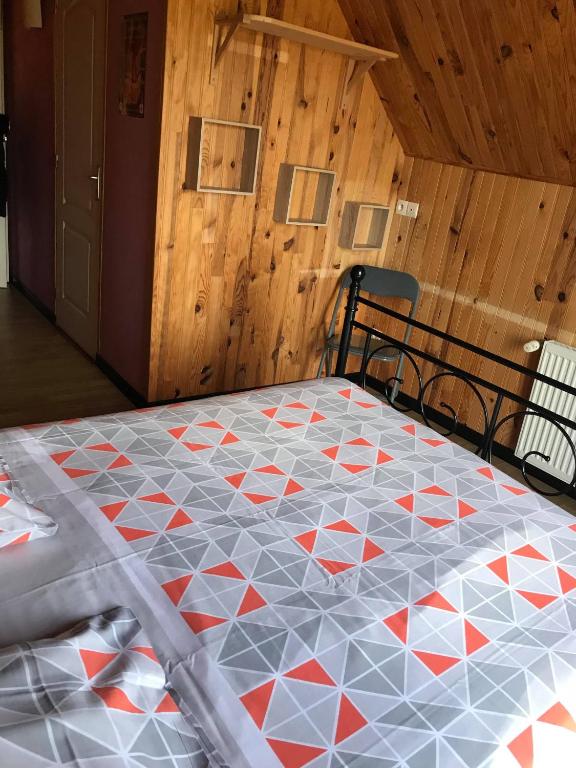 Postel nebo postele na pokoji v ubytování Le chant des oiseaux