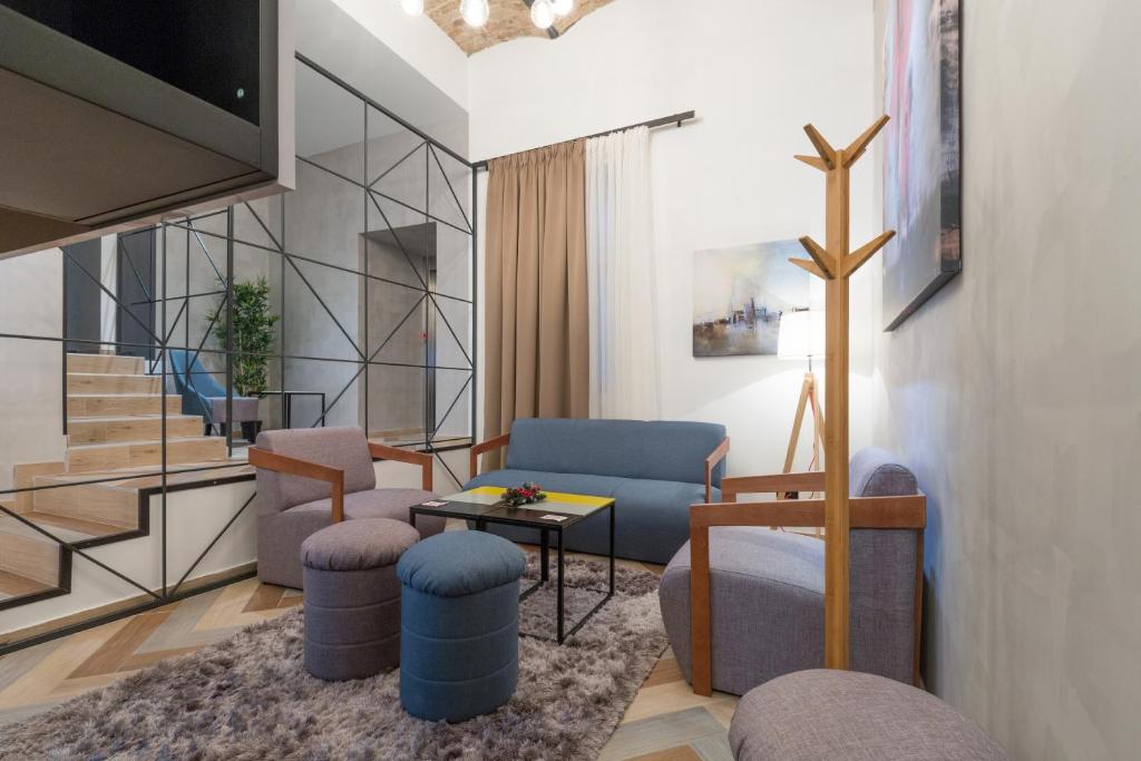 Posezení v ubytování Capital Hotel Garni