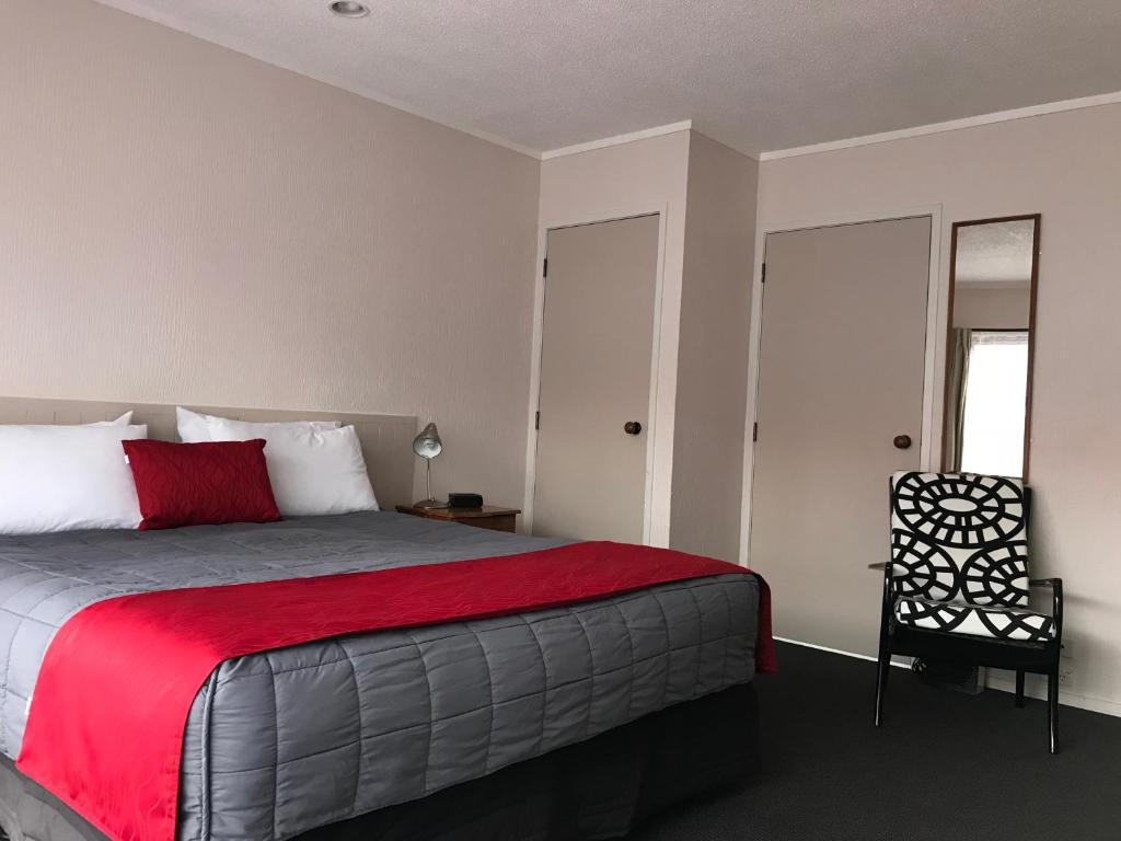 Postel nebo postele na pokoji v ubytování Edelweiss Motel