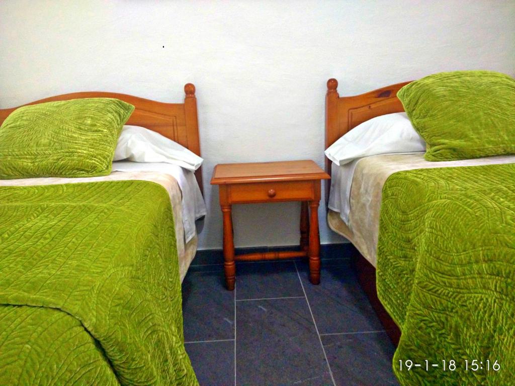 Posteľ alebo postele v izbe v ubytovaní Ocean Breeze Faro Sardina