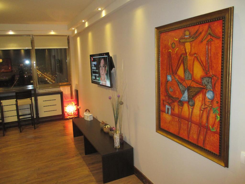 A television and/or entertainment centre at Genex Apartment