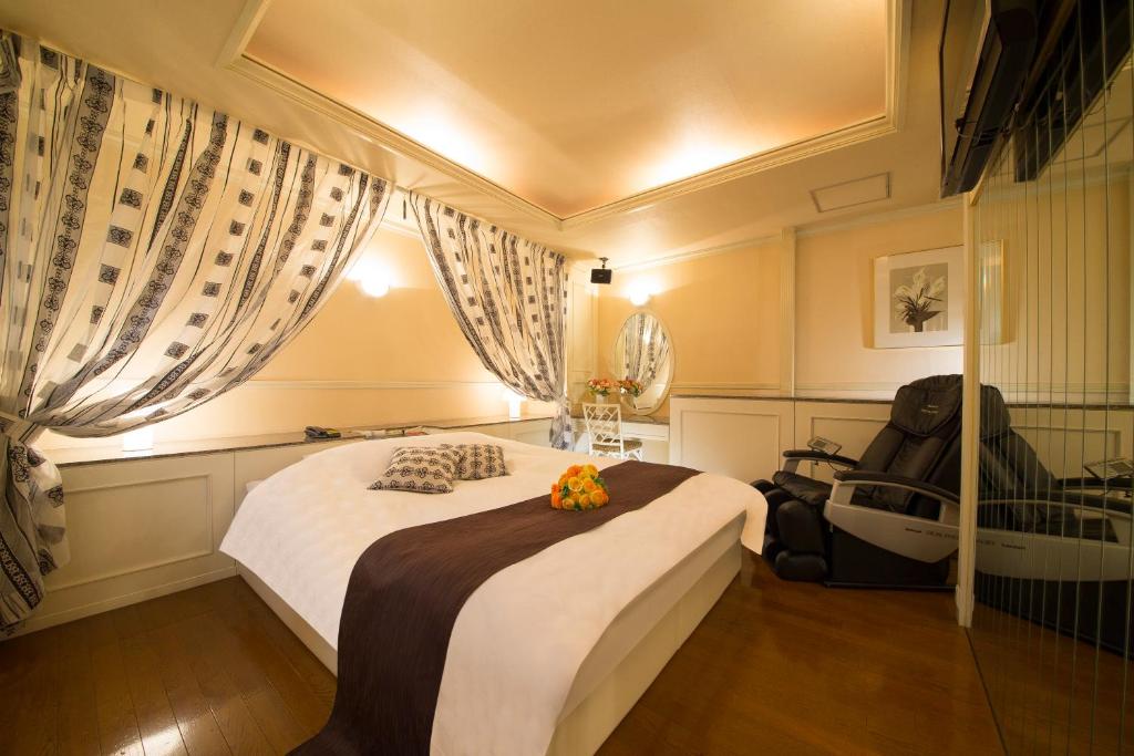 Postel nebo postele na pokoji v ubytování Towers Hotel - Adult Only -