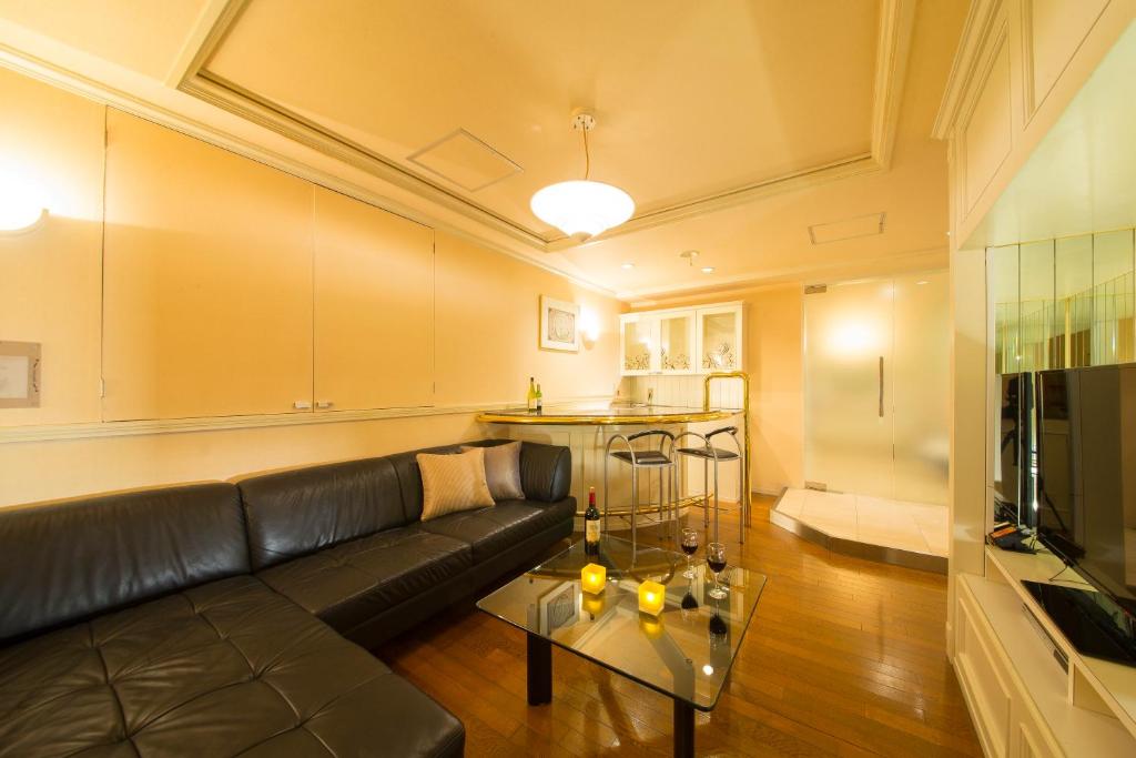 TV a/nebo společenská místnost v ubytování Towers Hotel - Adult Only -