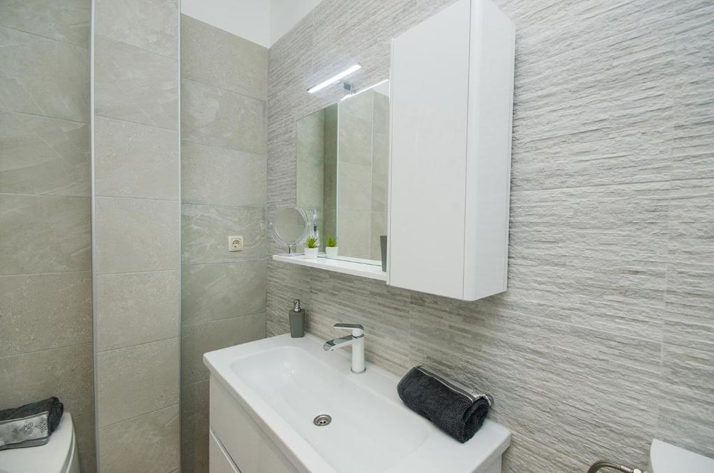 Kúpeľňa v ubytovaní Apartman Korina