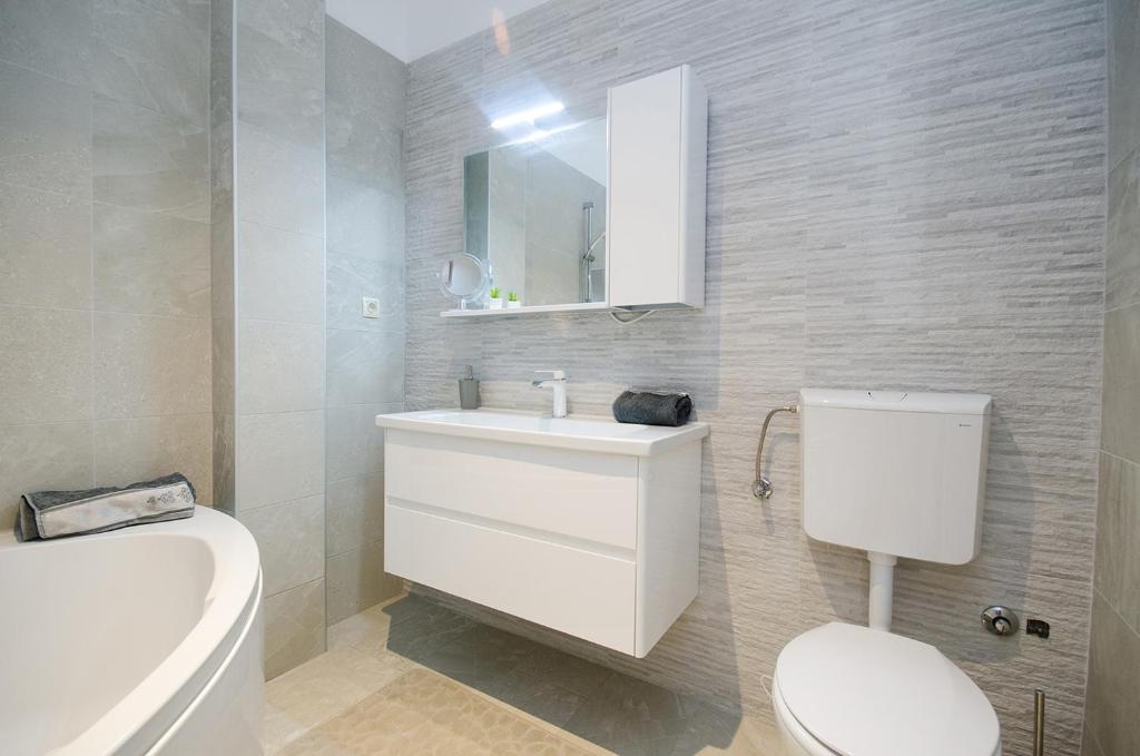 Kúpeľňa v ubytovaní Apartman Korina