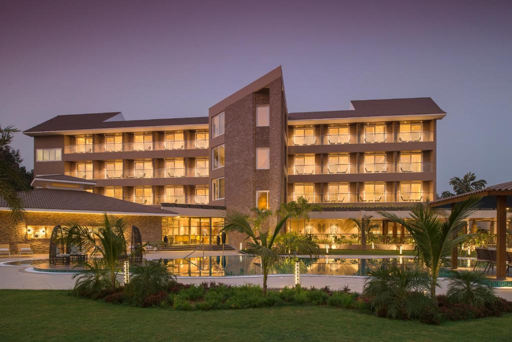 a rendering of a hotel at night at Kabir Hotel & Spa in Vadodara