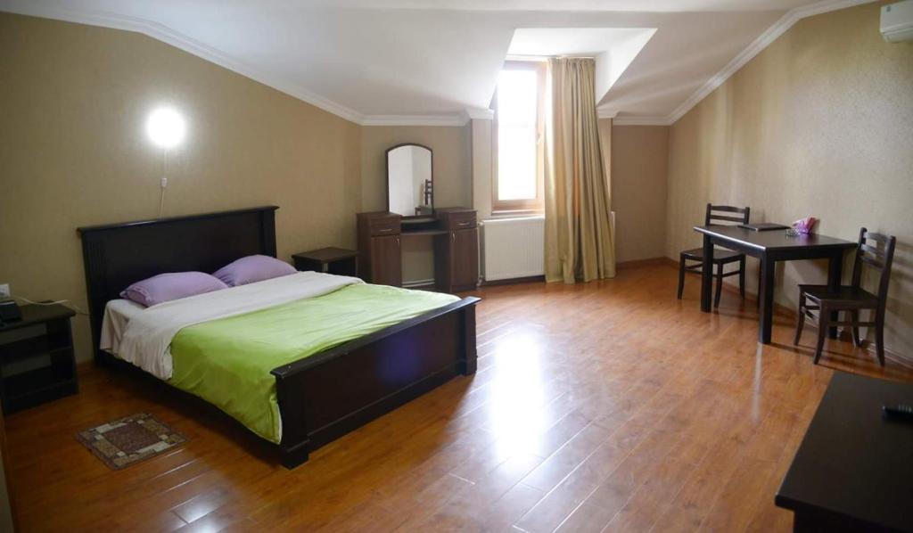 Postel nebo postele na pokoji v ubytování Hotel Emocia