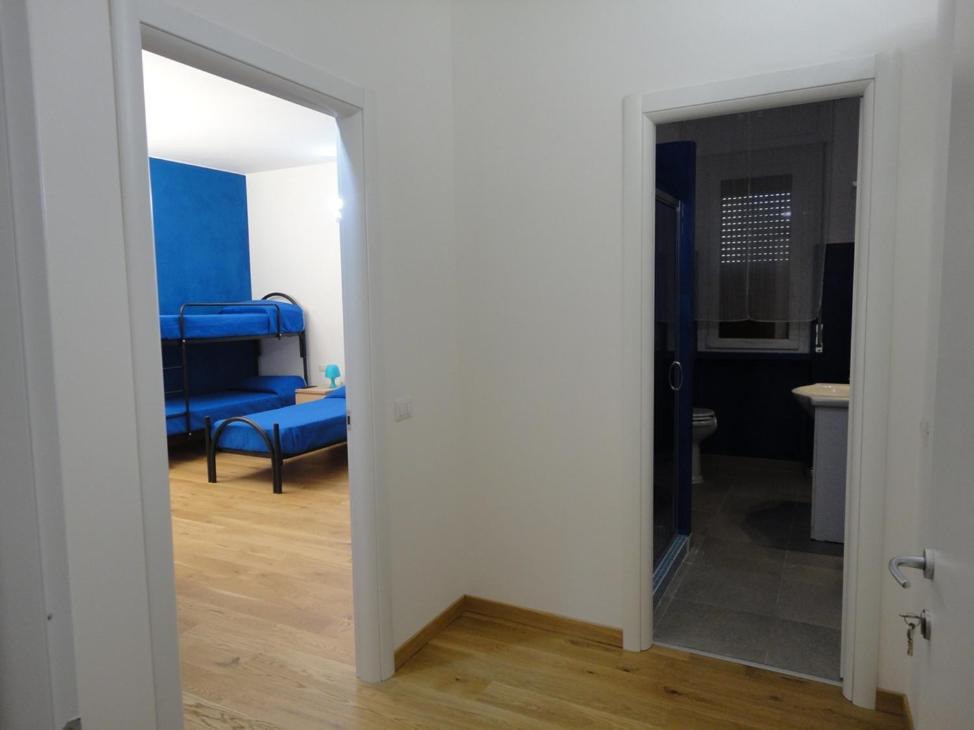 Postel nebo postele na pokoji v ubytování Pavia Ostello