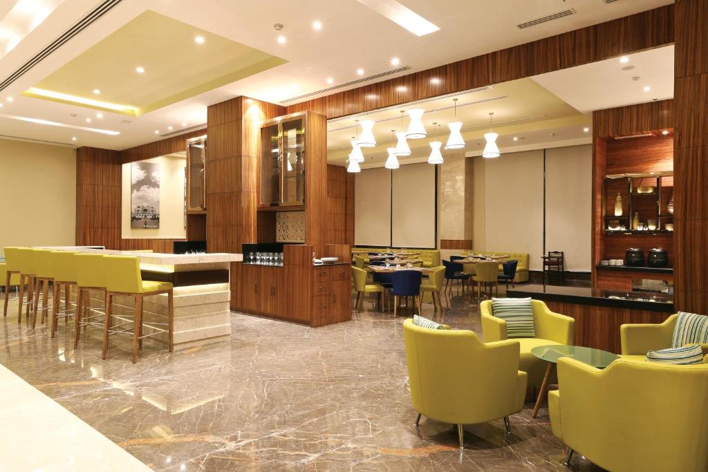 Posezení v ubytování Lemon Tree Hotel, Sector 68, Sohna Road, Gurugram
