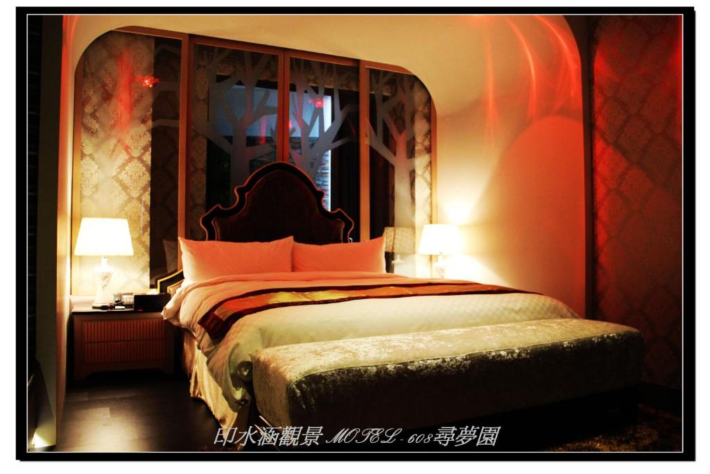 Postel nebo postele na pokoji v ubytování Yin Shui Han Motel