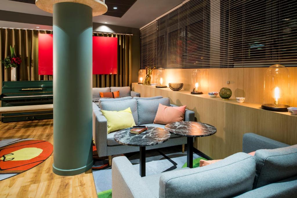 Coin salon dans l'établissement Aparthotel Adagio Paris Bercy Village