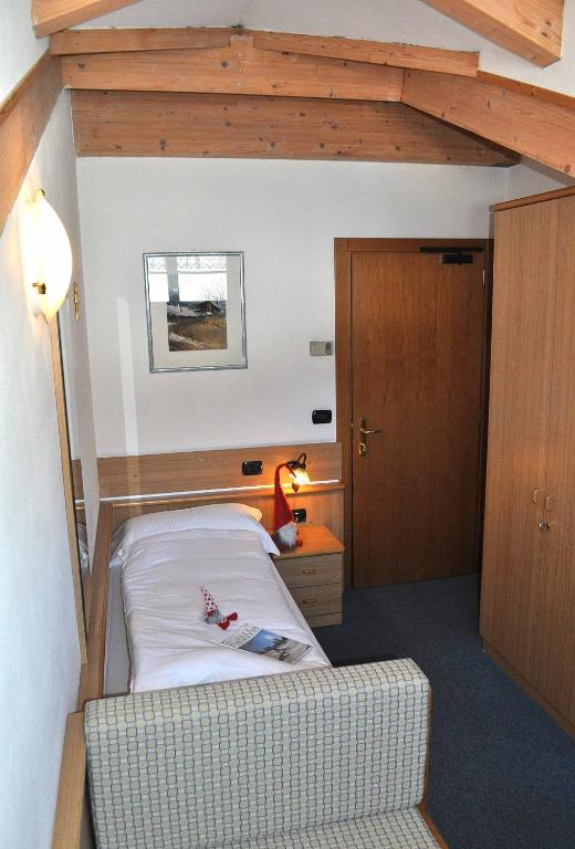 Postel nebo postele na pokoji v ubytování Albergo Antico