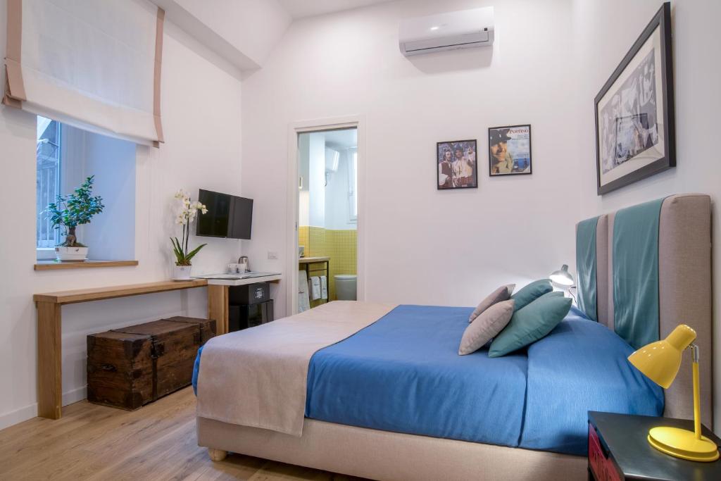 TV a/nebo společenská místnost v ubytování Napoliamo Guest House
