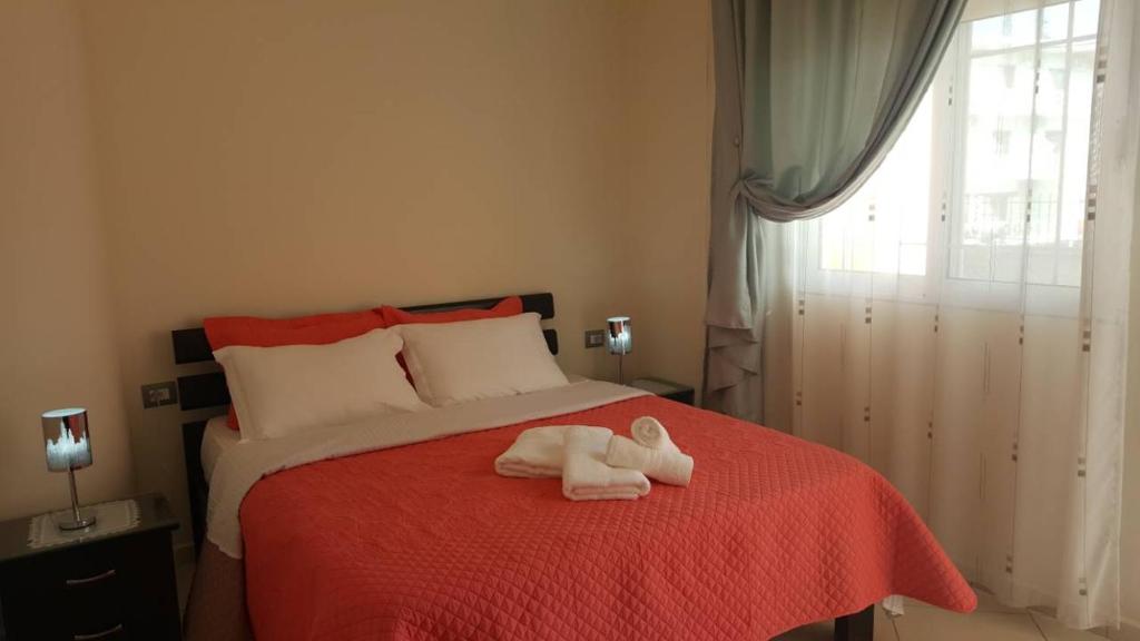 Postel nebo postele na pokoji v ubytování Villa Nicolaos Ksamil