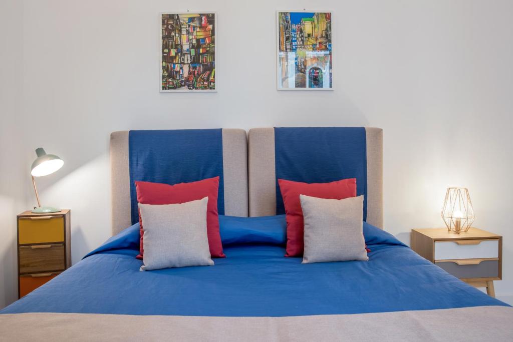 Postel nebo postele na pokoji v ubytování Napoliamo Guest House