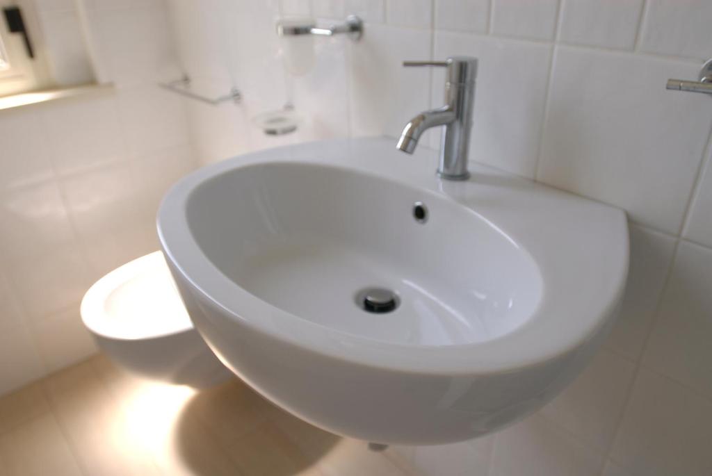 Koupelna v ubytování Hotel Gradara