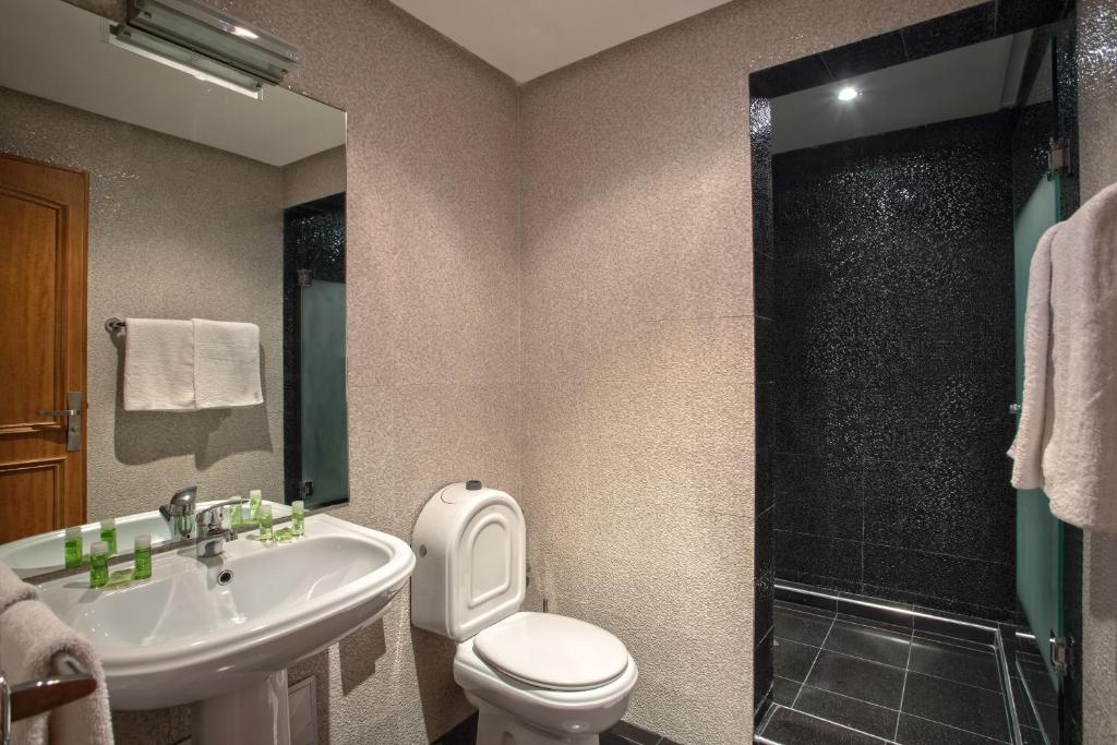 Koupelna v ubytování Yaad City Hotel