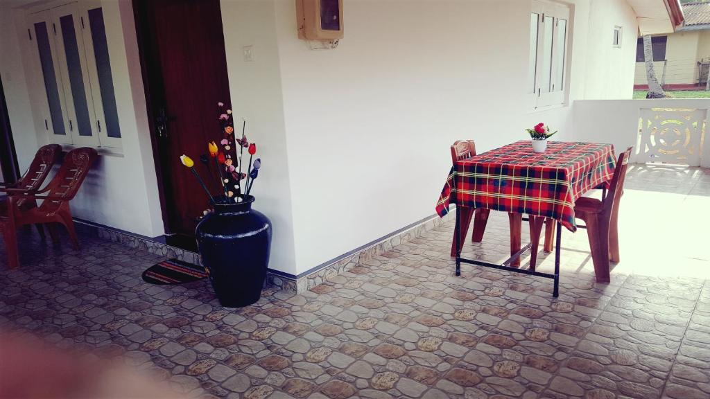 Posezení v ubytování Anura Home Stay