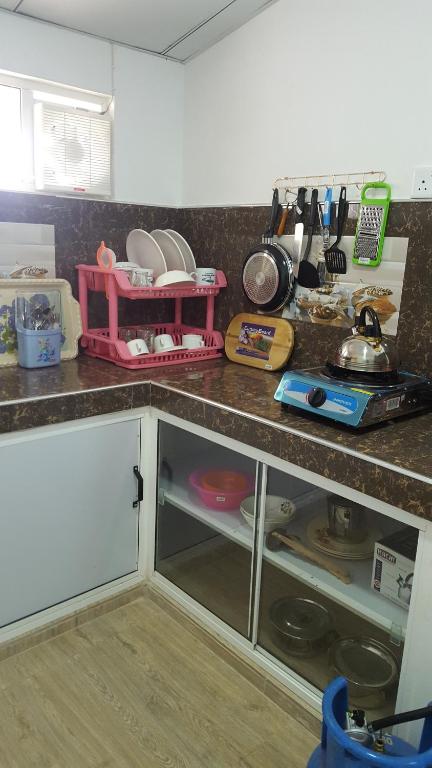 Kuchyň nebo kuchyňský kout v ubytování Anura Home Stay