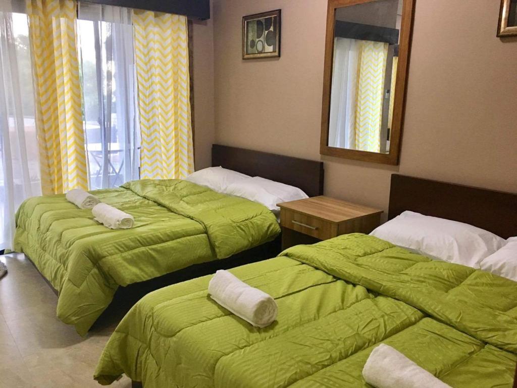 Postel nebo postele na pokoji v ubytování Secter Place