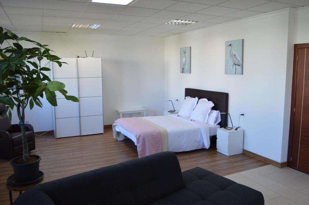 Posteľ alebo postele v izbe v ubytovaní Moai Loft
