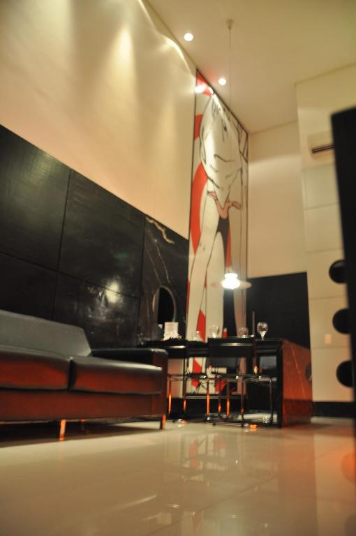 TV a/nebo společenská místnost v ubytování Palace Fortaleza Centro de Eventos motel