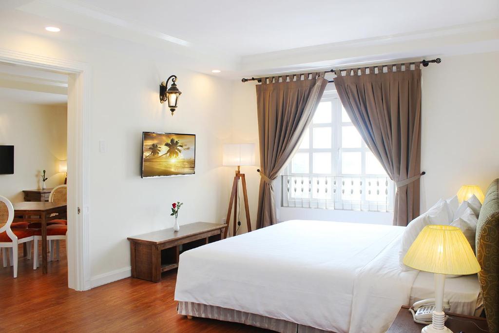 เตียงในห้องที่ Phoenix Hotel Vung Tau