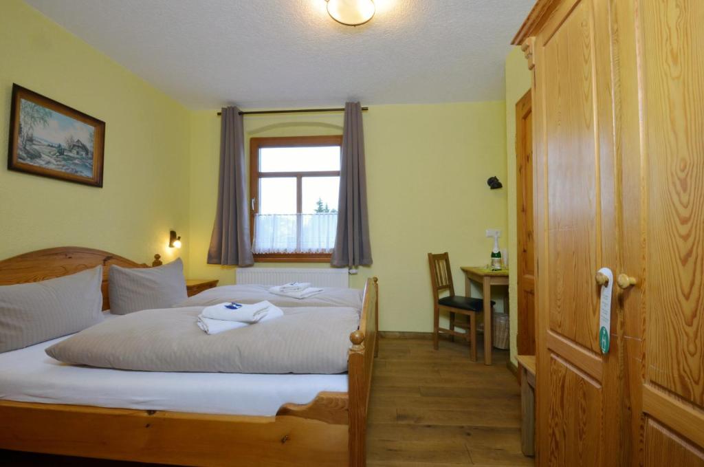 Postel nebo postele na pokoji v ubytování Hotel Köhlerhütte