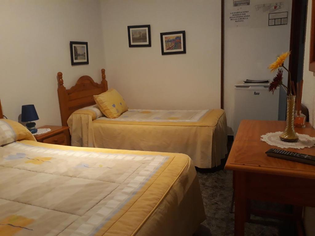 Postel nebo postele na pokoji v ubytování San Cristobal