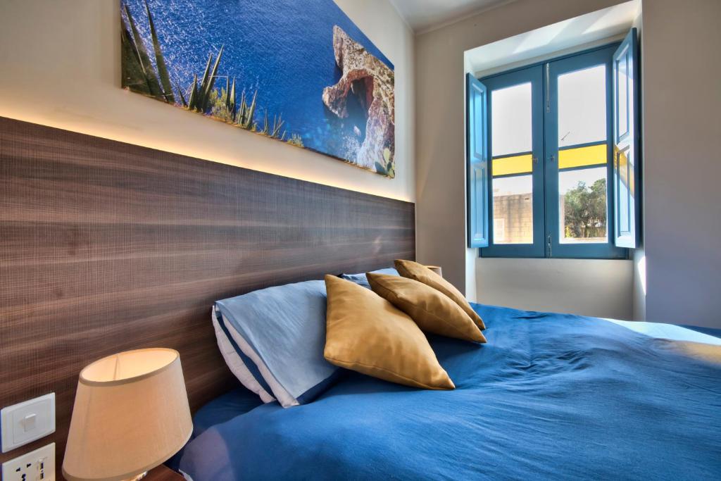 Postel nebo postele na pokoji v ubytování Central Suites St. Julian's