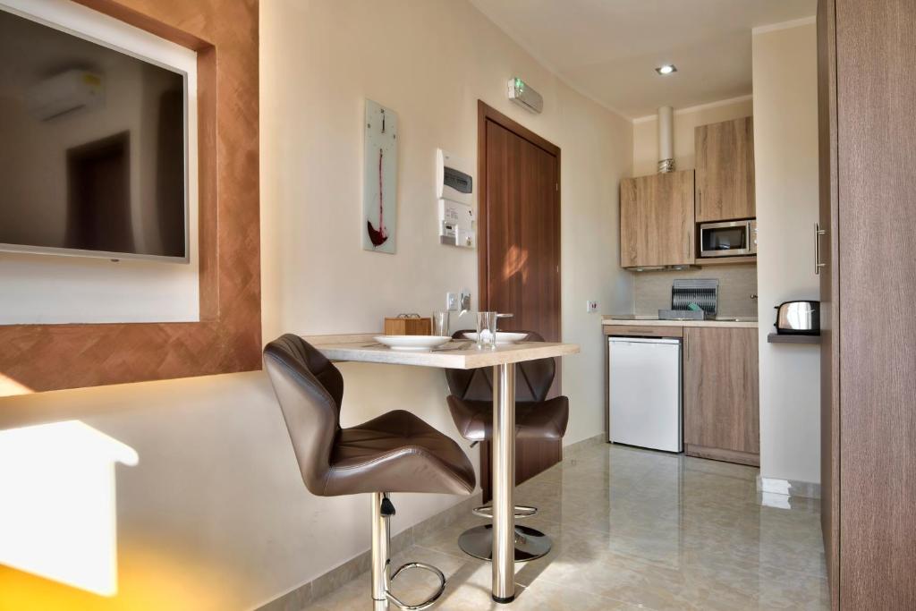 Kuchyň nebo kuchyňský kout v ubytování Central Suites St. Julian's