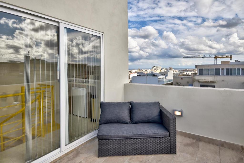 Posezení v ubytování Central Suites St. Julian's
