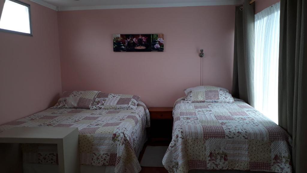 Postel nebo postele na pokoji v ubytování Apart Hotel Colors