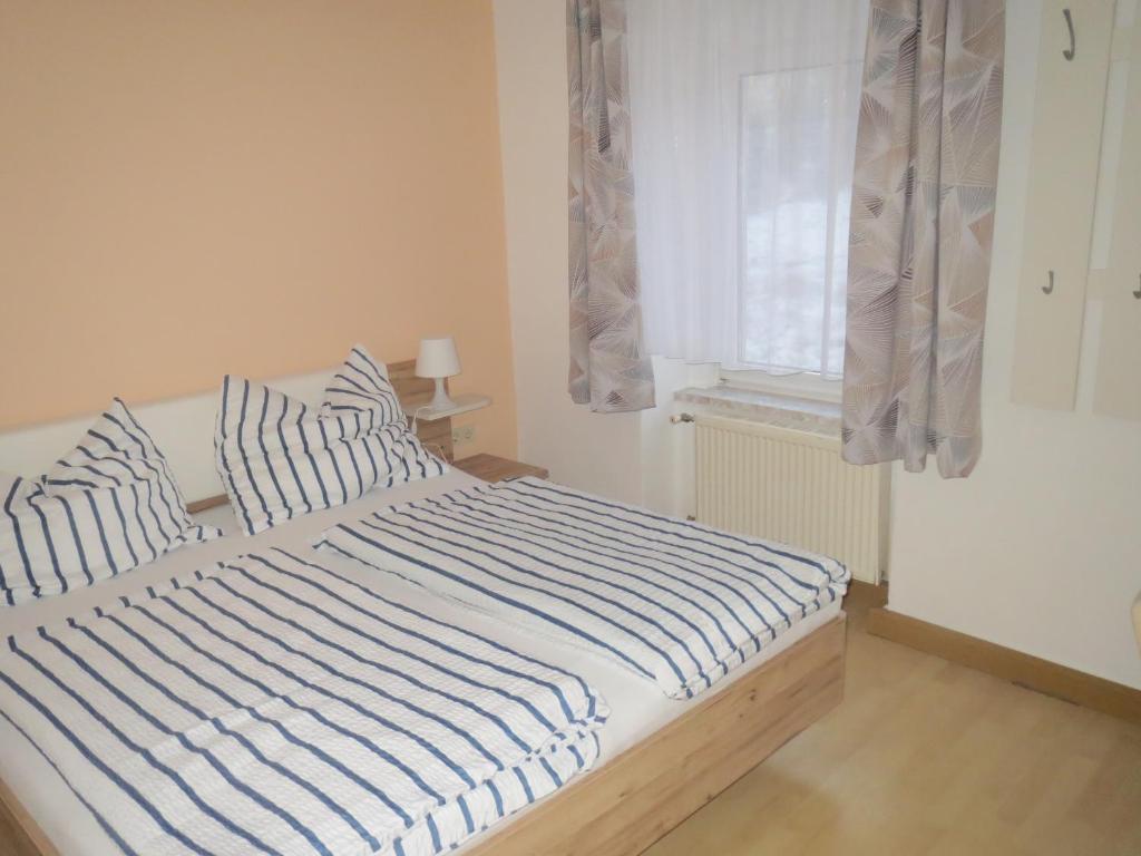 Postel nebo postele na pokoji v ubytování Gasthof Maly