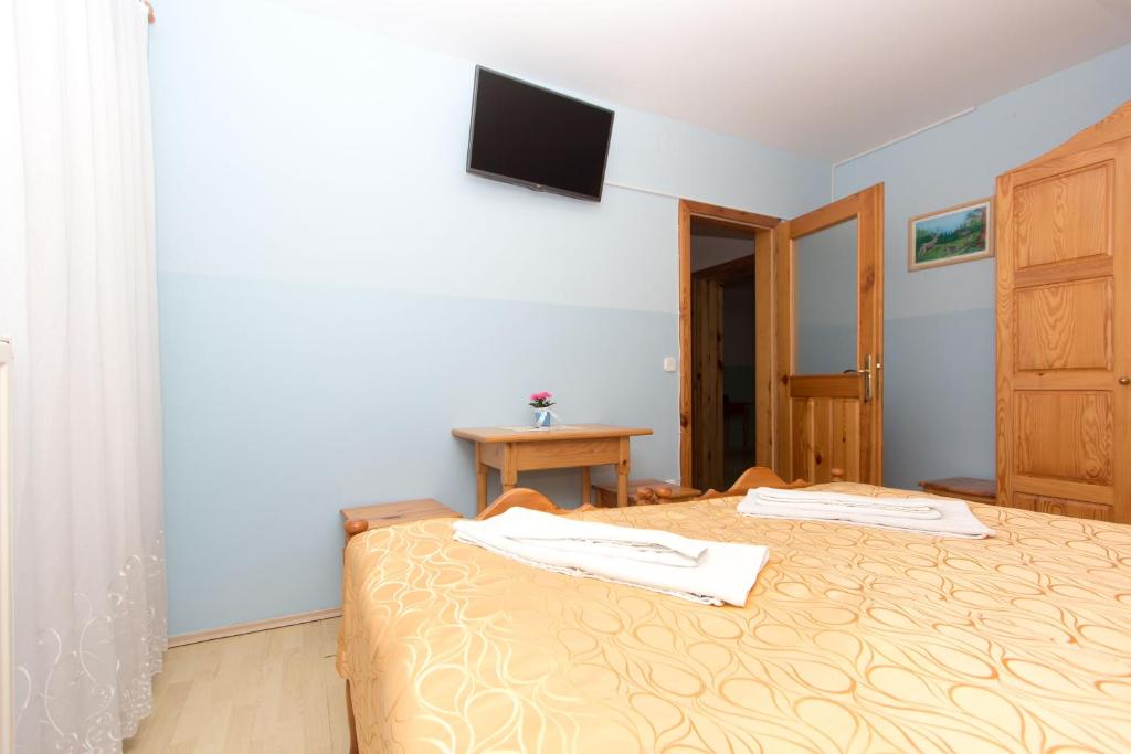 Voodi või voodid majutusasutuse Guesthouse Kaučič toas