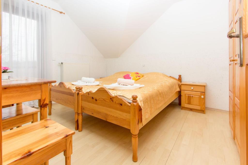 Voodi või voodid majutusasutuse Guesthouse Kaučič toas