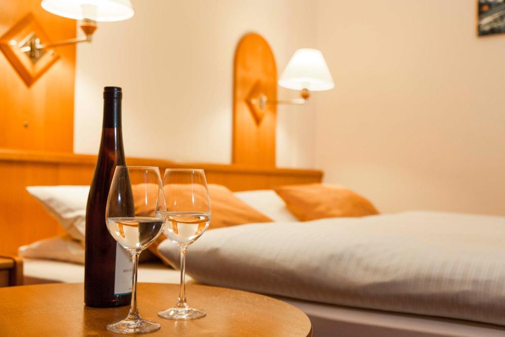 Postel nebo postele na pokoji v ubytování Hotel Zum Bären