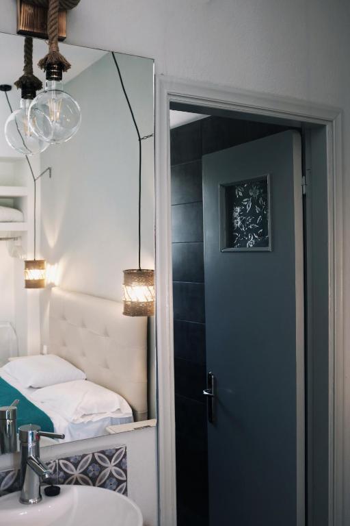 Posteľ alebo postele v izbe v ubytovaní Esperida rooms & studios