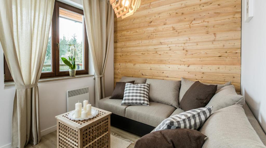 Posedenie v ubytovaní TWOJA CHATA Apartament pod lasem zarezerwuj na podhalami pl