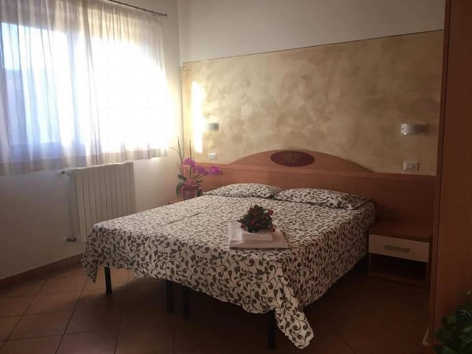 Postel nebo postele na pokoji v ubytování Agriturismo Al Franet