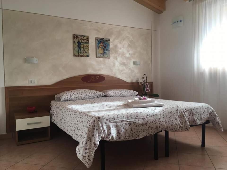 Postel nebo postele na pokoji v ubytování Agriturismo Al Franet
