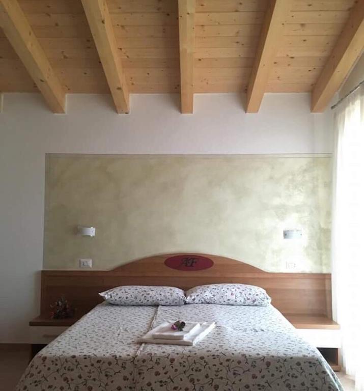Postel nebo postele na pokoji v ubytování Agriturismo Al Franet