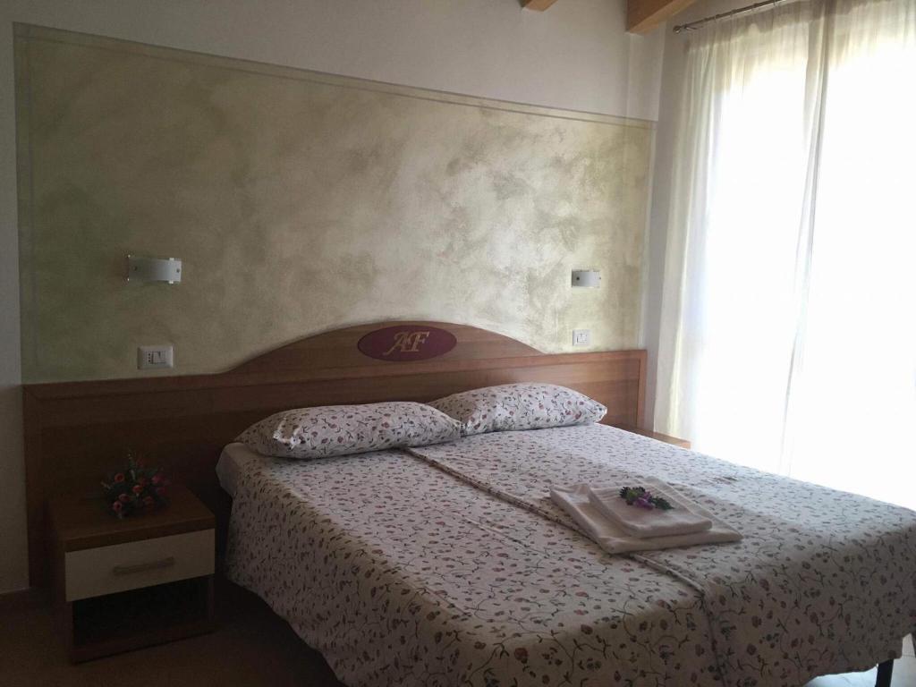 Postel nebo postele na pokoji v ubytování Agriturismo Al Franet