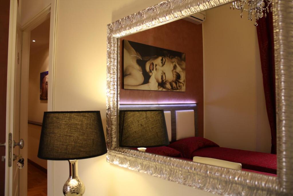 A bed or beds in a room at Residenza Elizabeth