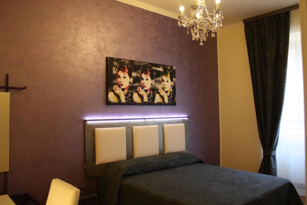 A bed or beds in a room at Residenza Elizabeth