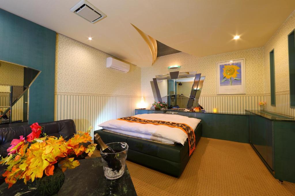Postel nebo postele na pokoji v ubytování Hotel La Siena (Adult Only)